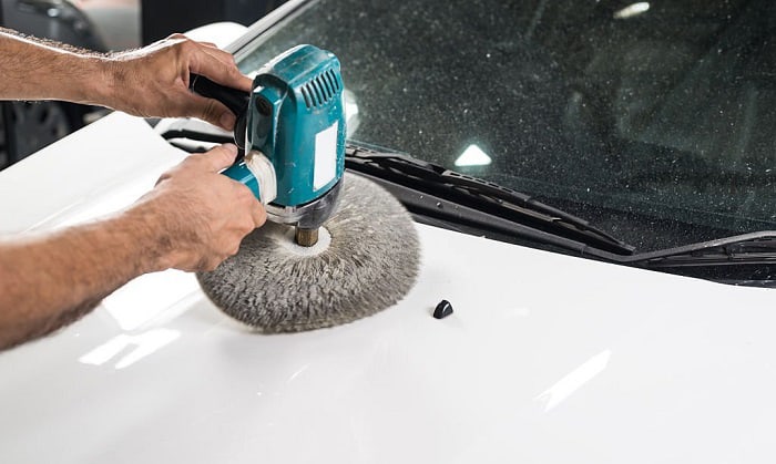 polishing a boat